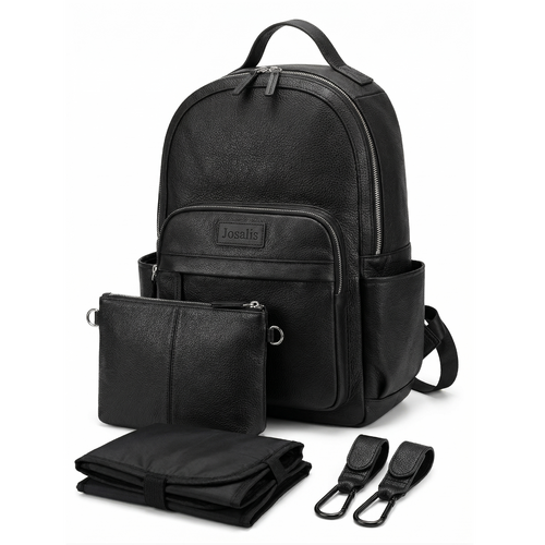 Black backpack style nappy bag with accessories on a white background
