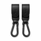 Two black leather Mira Buggy clips with matte black carabiners 